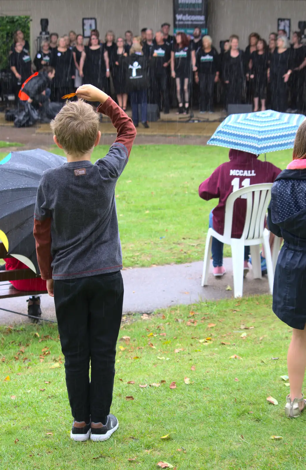 Fred makes an umbrella out of a leaf, from Diss Fest, or Singin' in the Rain, Diss, Norfolk - 23rd July 2017