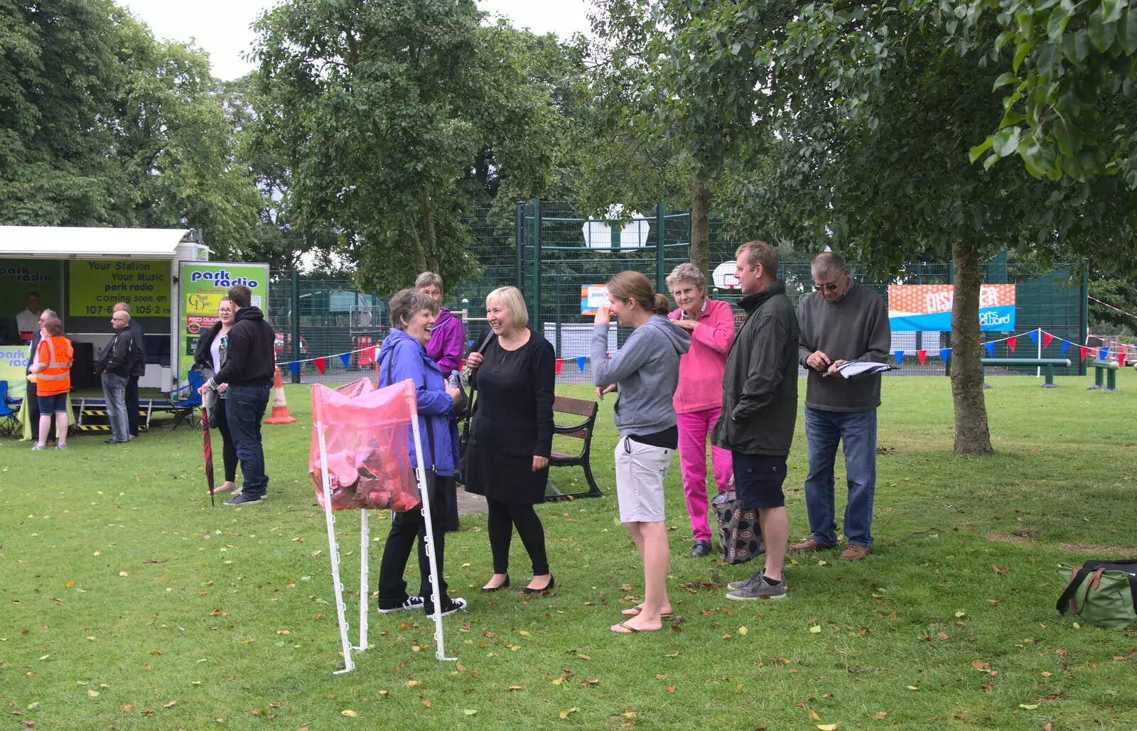 Isobel and Rachel chat with friends, from Diss Fest, or Singin' in the Rain, Diss, Norfolk - 23rd July 2017