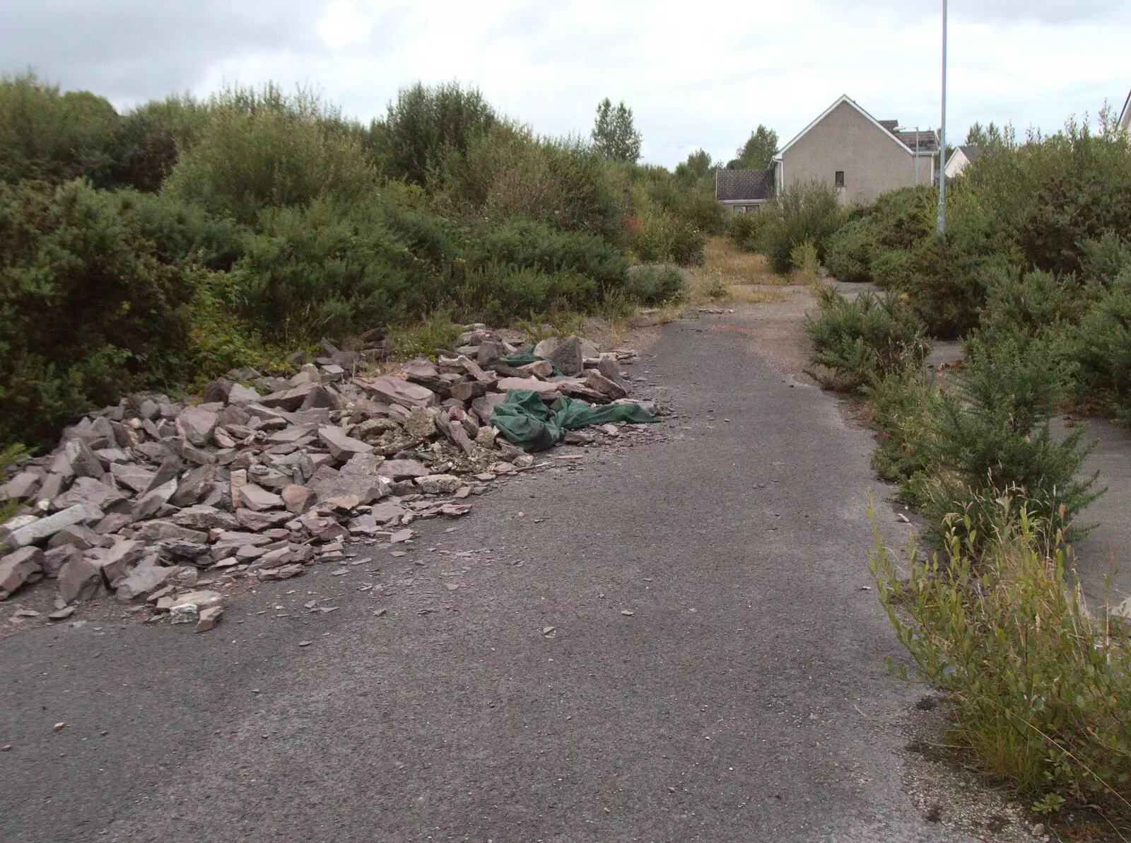 There's a big pile of rubble on the street, from Baile an Sceilg to An tSnaidhme, Co. Kerry, Ireland - 31st July 2017