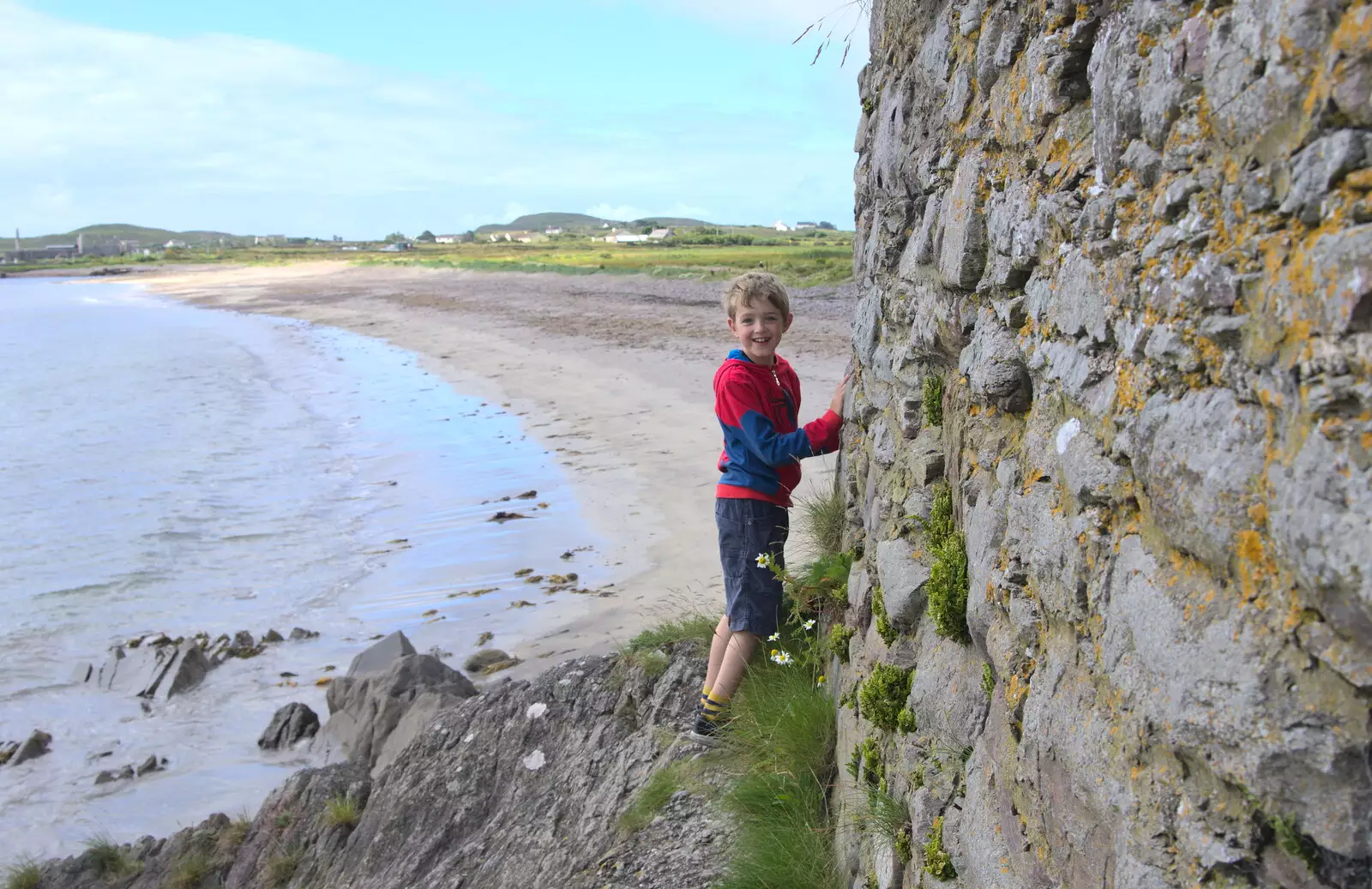 Fred climbs round the outside of the castle, from Baile an Sceilg to An tSnaidhme, Co. Kerry, Ireland - 31st July 2017