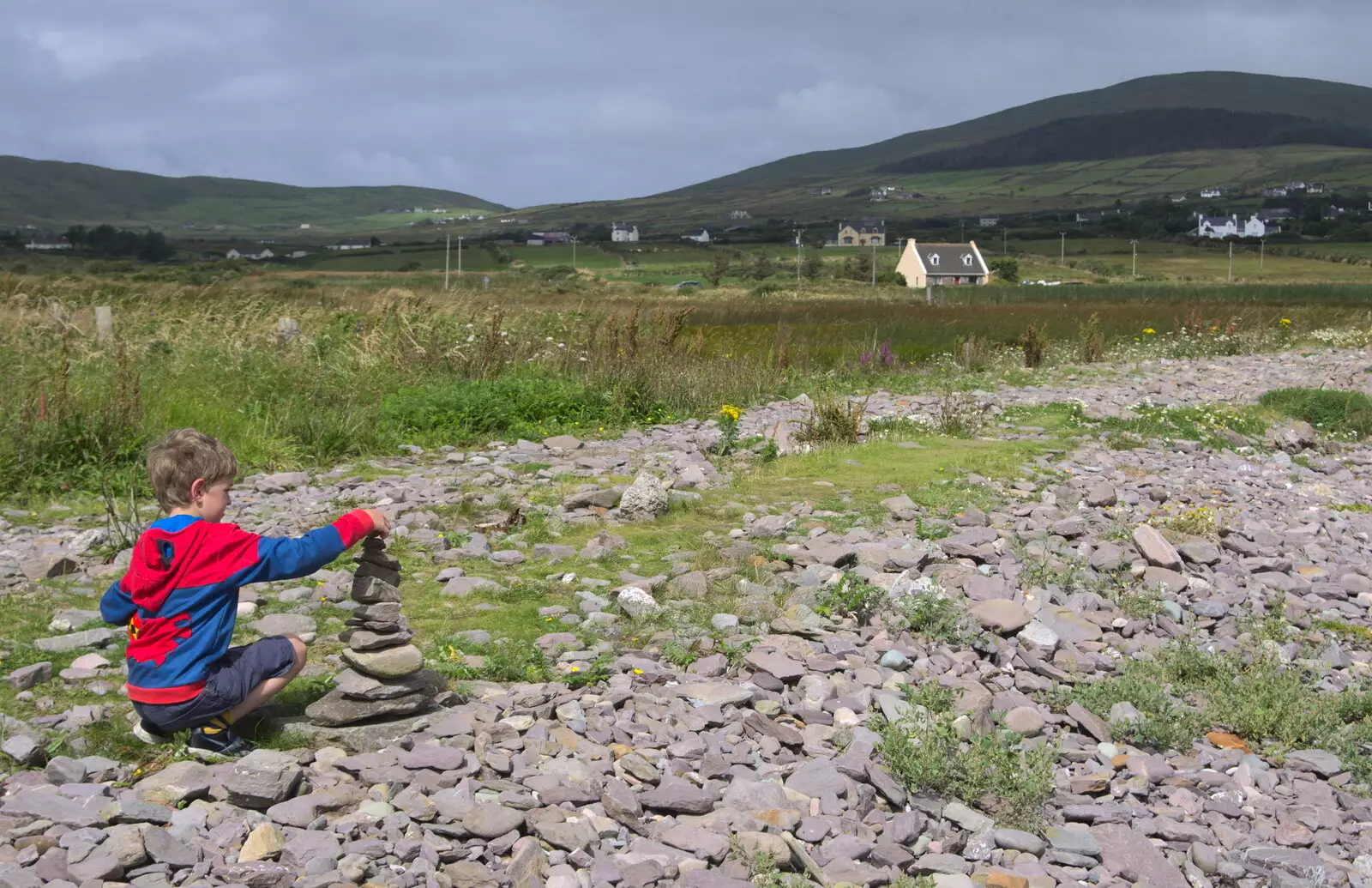 Fred adds to a cairn, from Baile an Sceilg to An tSnaidhme, Co. Kerry, Ireland - 31st July 2017