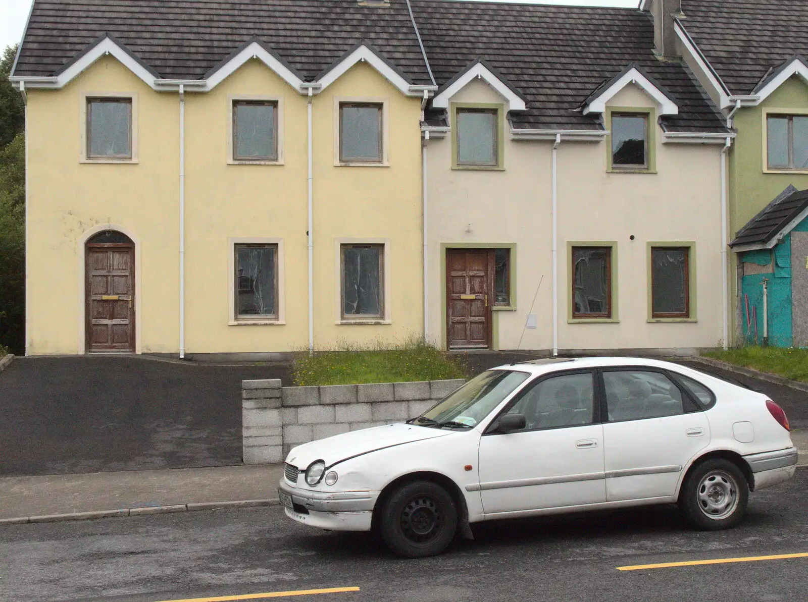 A wrecked car outside the Ghost Estate, from In The Sneem, An tSnaidhm, Kerry, Ireland - 1st August 2017