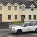 A wrecked car outside the Ghost Estate, In The Sneem, An tSnaidhm, Kerry, Ireland - 1st August 2017