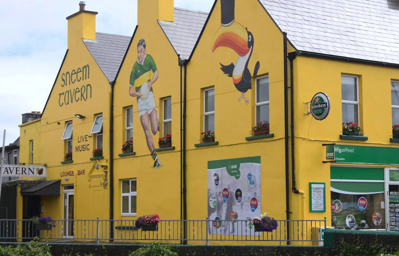 Guinness ads and GAA paintings on the Sneem Tavern, from In The Sneem, An tSnaidhm, Kerry, Ireland - 1st August 2017