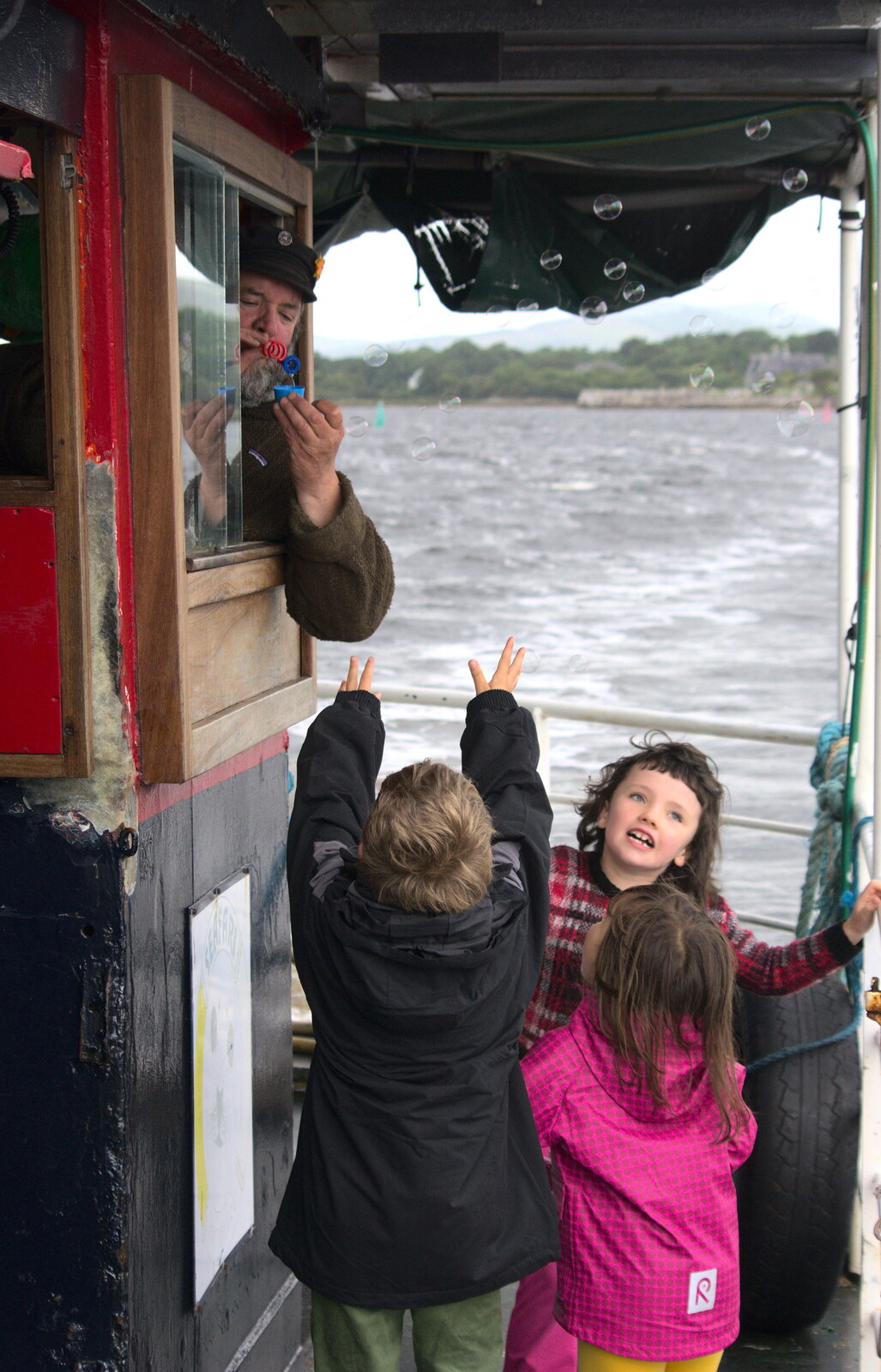 The cap'n blows bubbles at the children from A Seafari Boat Trip, Kenmare, Kerry, Ireland - 3rd August 2017