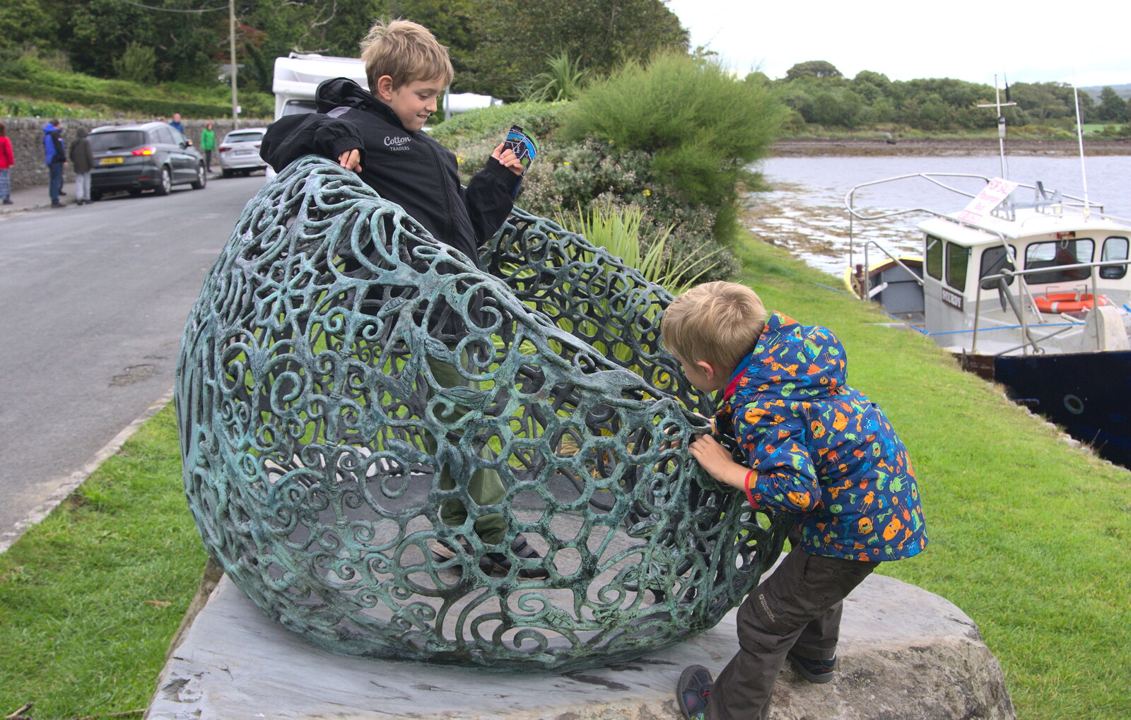 The boys interact with some sculpture from A Seafari Boat Trip, Kenmare, Kerry, Ireland - 3rd August 2017