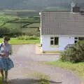 Isobel walks up the drive with a flower, The Annascaul 10k Run, Abha na Scáil, Kerry, Ireland - 5th August 2017