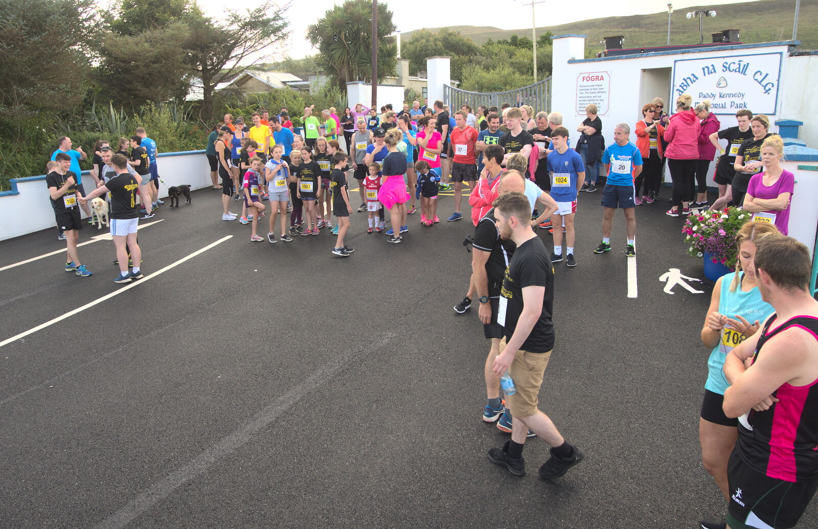 Runners gather at the starting line from The Annascaul 10k Run, Abha na Scáil, Kerry, Ireland - 5th August 2017