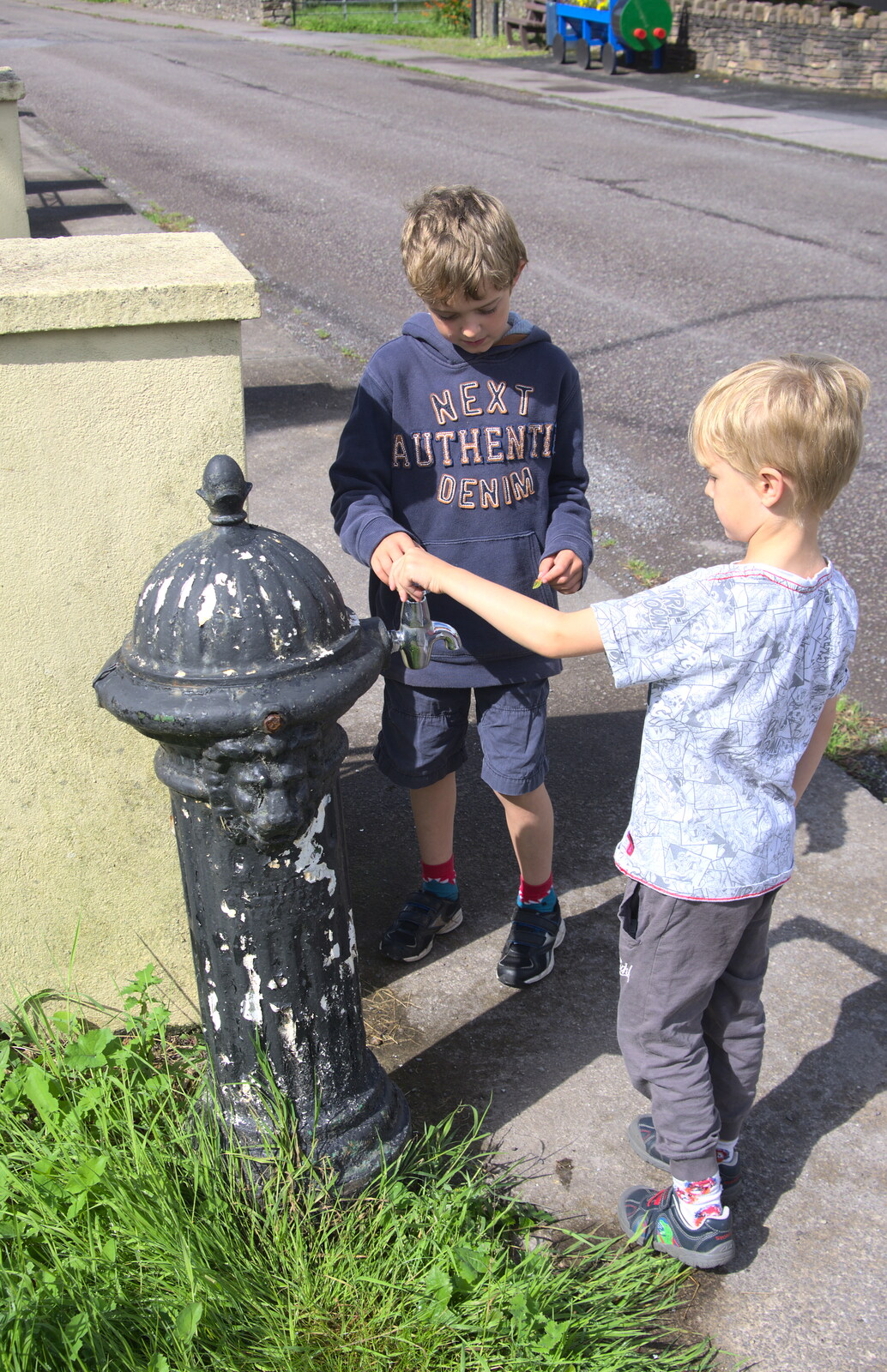 The boys find a water pump from The Annascaul 10k Run, Abha na Scáil, Kerry, Ireland - 5th August 2017