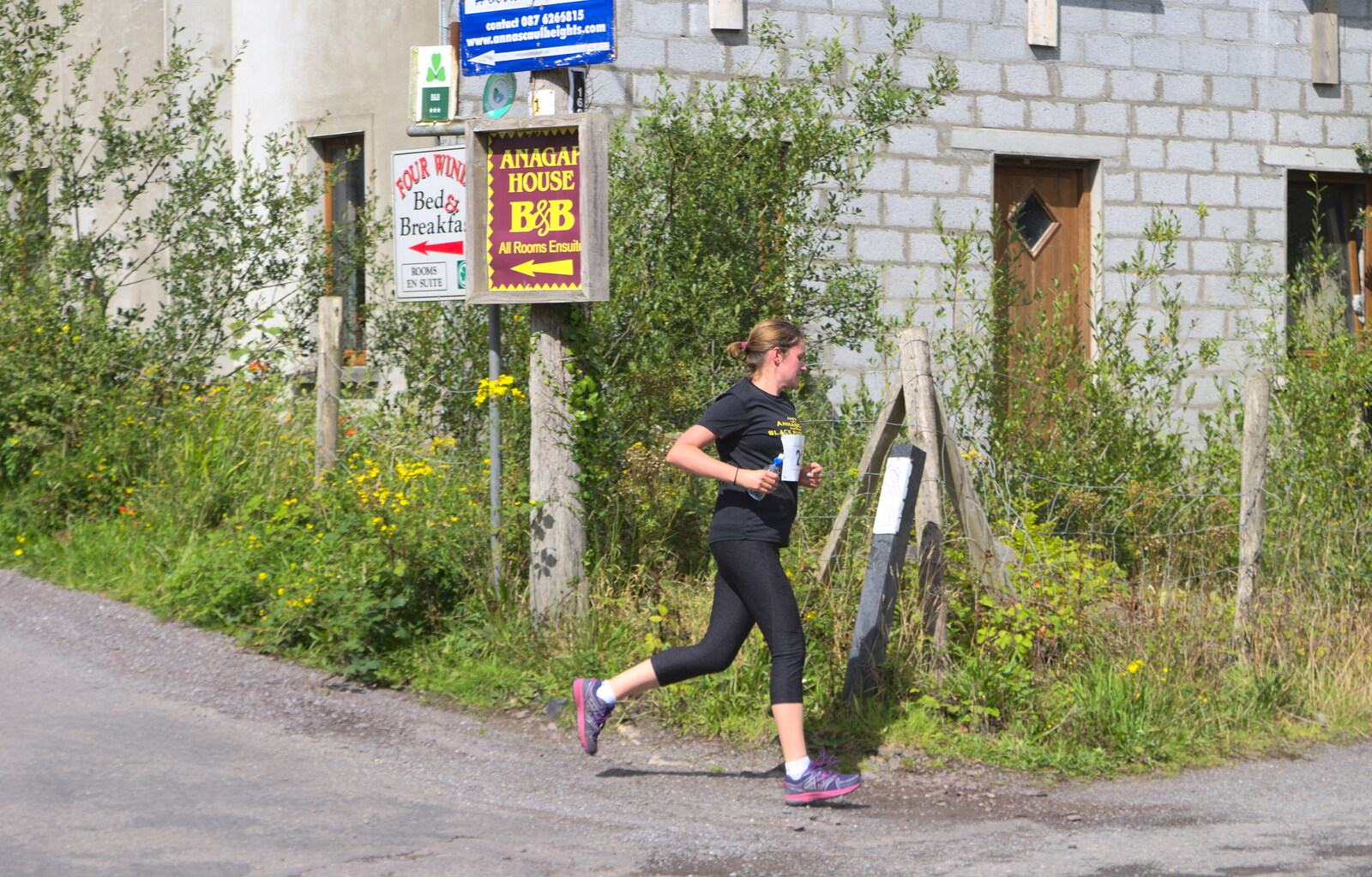 Isobel passes the half-way mark from The Annascaul 10k Run, Abha na Scáil, Kerry, Ireland - 5th August 2017