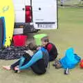 The boarders peel of their wetsuits, Surfing Achill Island, Oileán Acla, Maigh Eo, Ireland - 8th August 2017