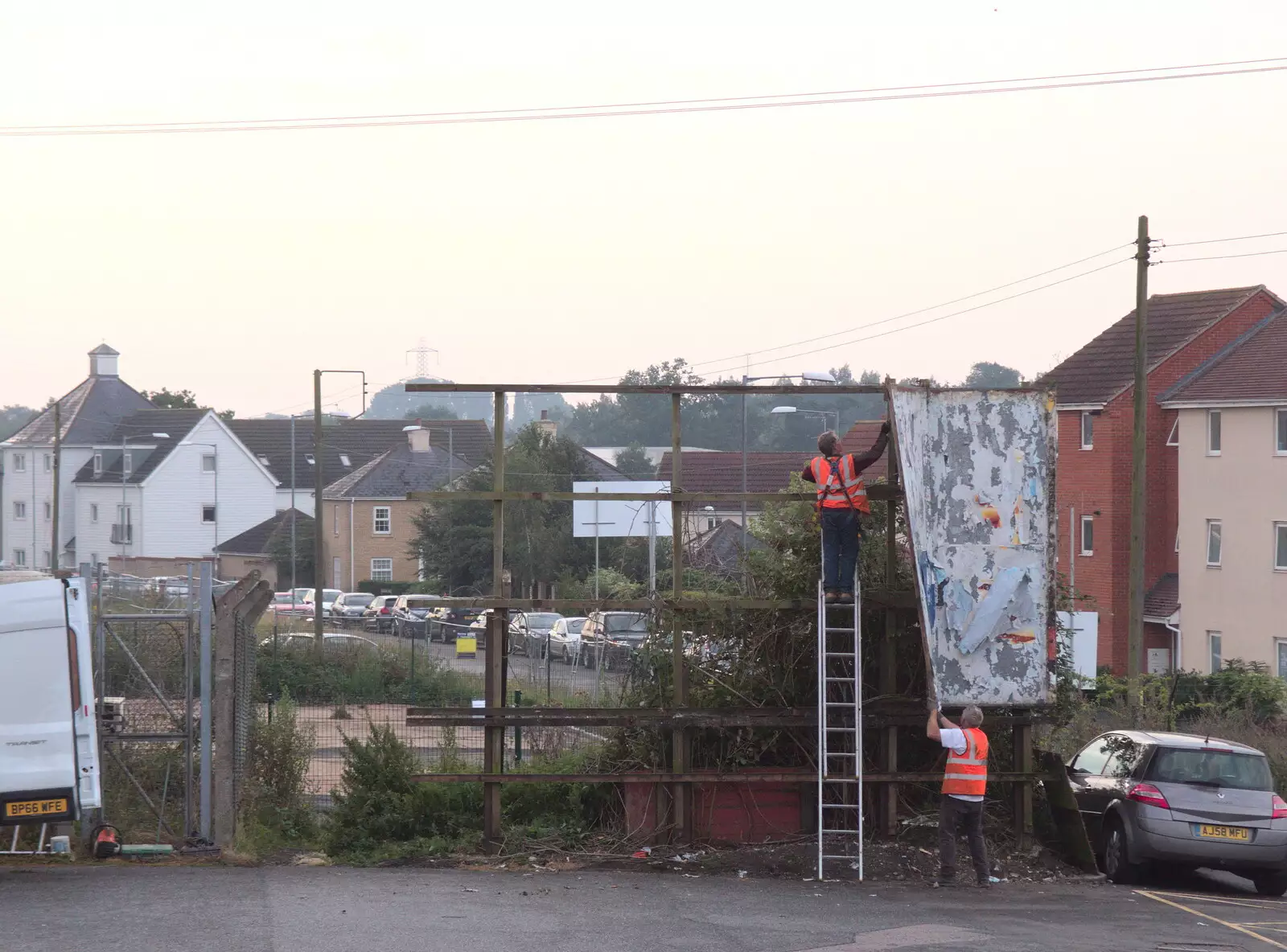 An old billboard is removed at Diss Station, from The BSCC at Yaxley and the Hoxne Beer Festival, Suffolk - 31st August 2017