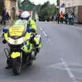 The first rozzer turns up as it kicks off, The Tour of Britain Does Eye, Suffolk - 8th September 2017