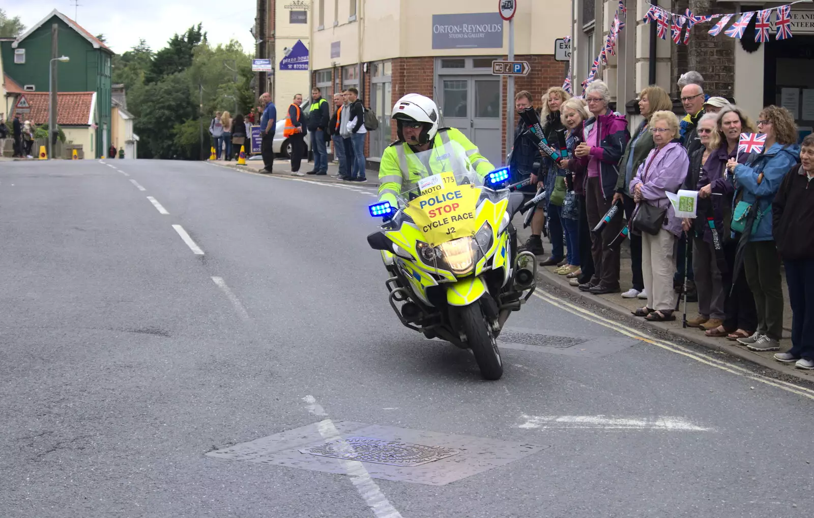 Another motorbike rozzer roars through Eye, from The Tour of Britain Does Eye, Suffolk - 8th September 2017