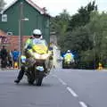 More motorbikes appear up the hill, The Tour of Britain Does Eye, Suffolk - 8th September 2017