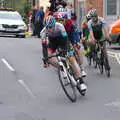 The peloton rounds the corner outside the Bank, The Tour of Britain Does Eye, Suffolk - 8th September 2017