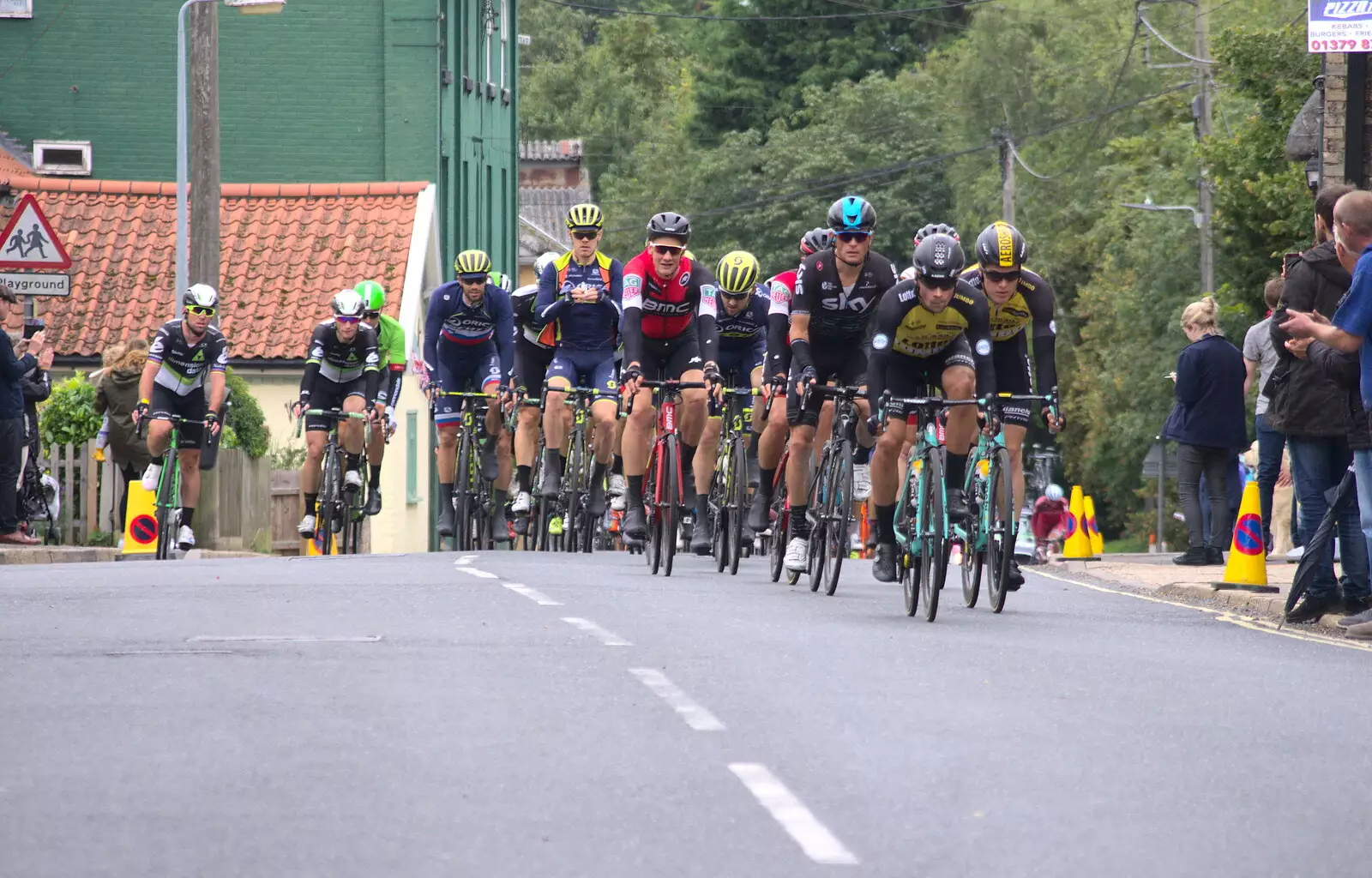 The main group appears on Magdalen Street, from The Tour of Britain Does Eye, Suffolk - 8th September 2017