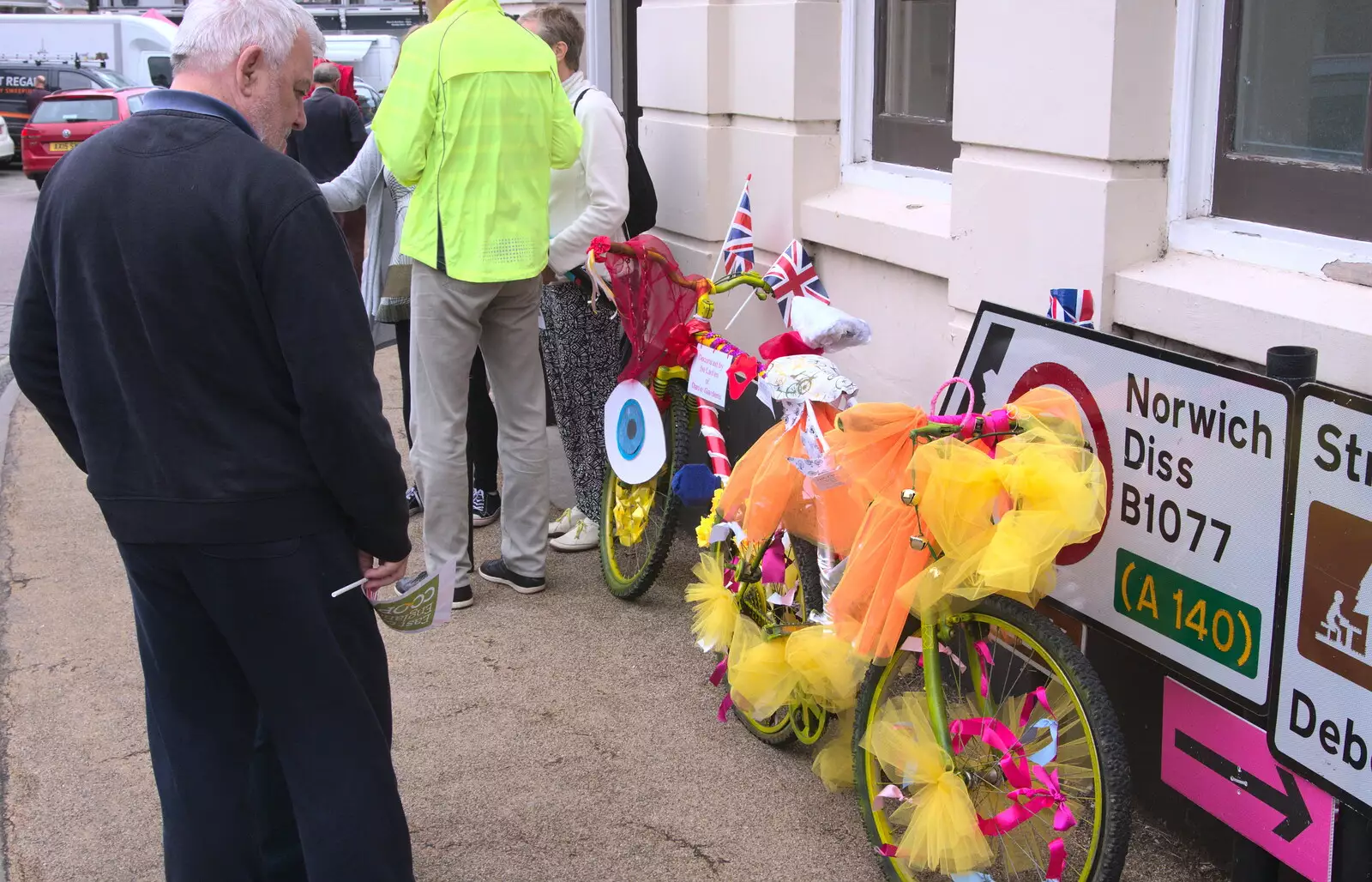 Some geezer inspects the decorated bikes, from The Tour of Britain Does Eye, Suffolk - 8th September 2017