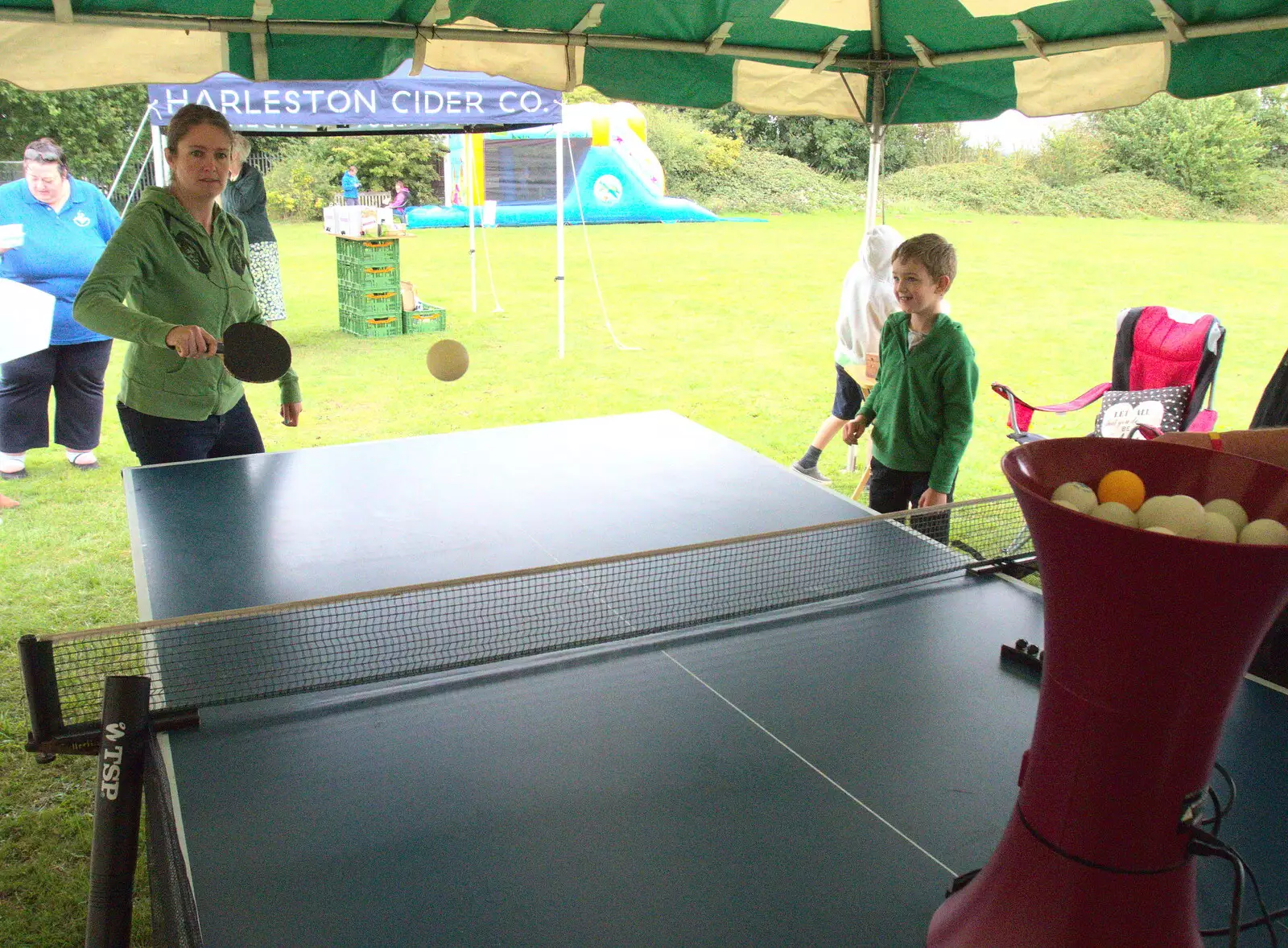 Isobel tests out Wavy's ping pong tent, from A Summer Fete, Palgrave, Suffolk - 10th September 2017