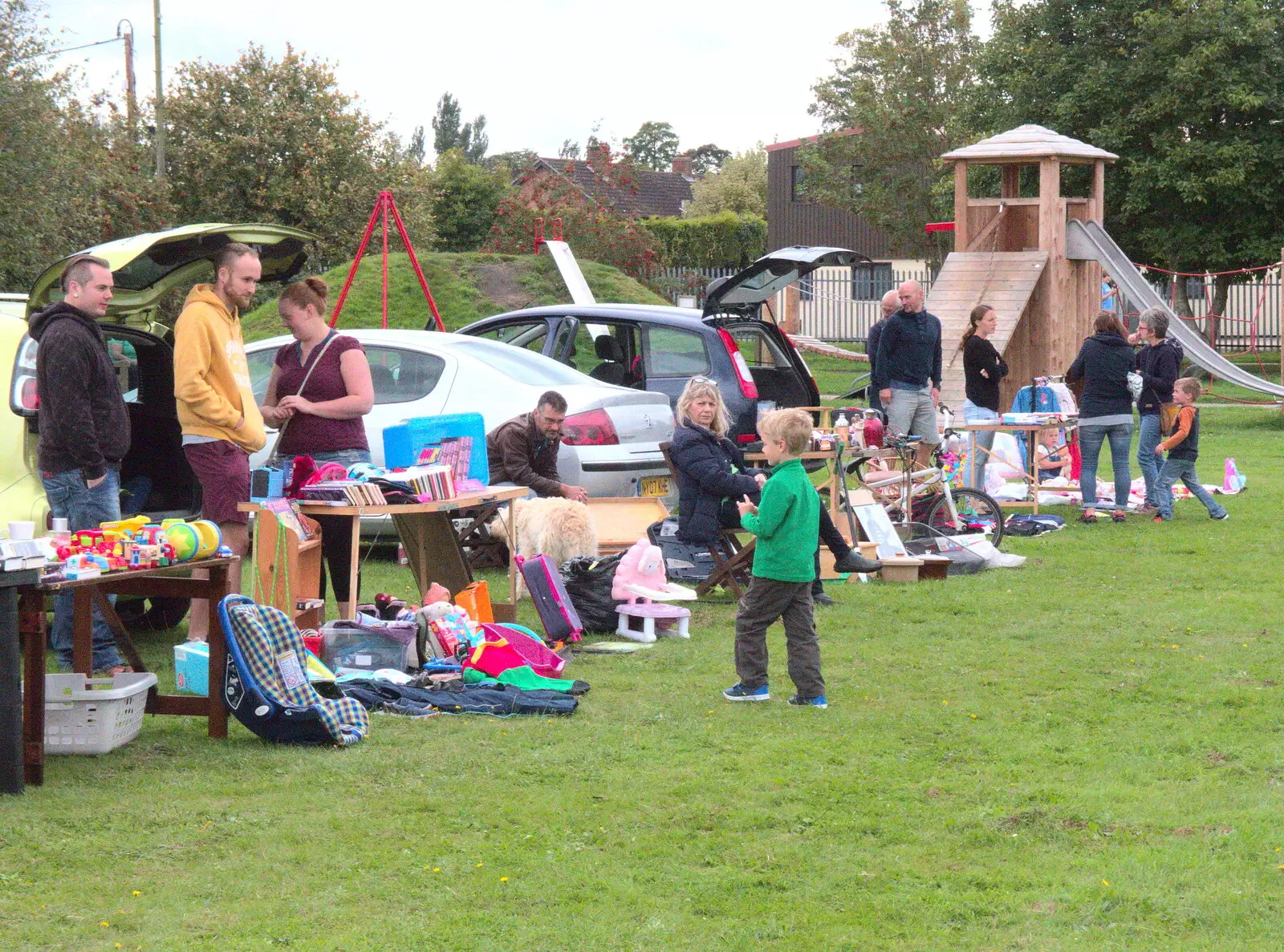 Harry checks out the random guff in the car boot, from A Summer Fete, Palgrave, Suffolk - 10th September 2017