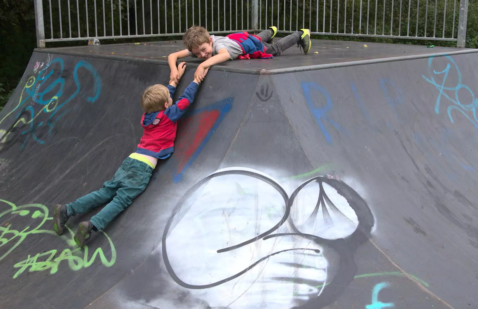 Fred hangs on to Harry, from Skate Parks and Orange Skies, Brome and Eye, Suffolk - 10th October 2017