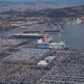 The plane's final approach is over the docks, Barcelona and Parc Montjuïc, Catalonia, Spain - 21st October 2017