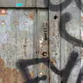 Graffiti and decaying paint on a door, Barcelona and Parc Montjuïc, Catalonia, Spain - 21st October 2017