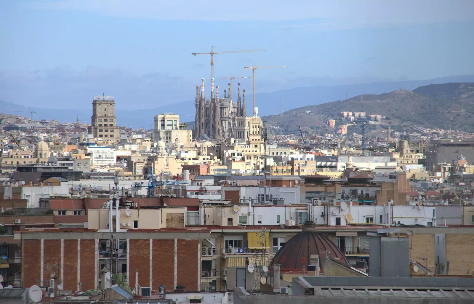 A view of La Sagrada Familia, from Barcelona and Parc Montjuïc, Catalonia, Spain - 21st October 2017