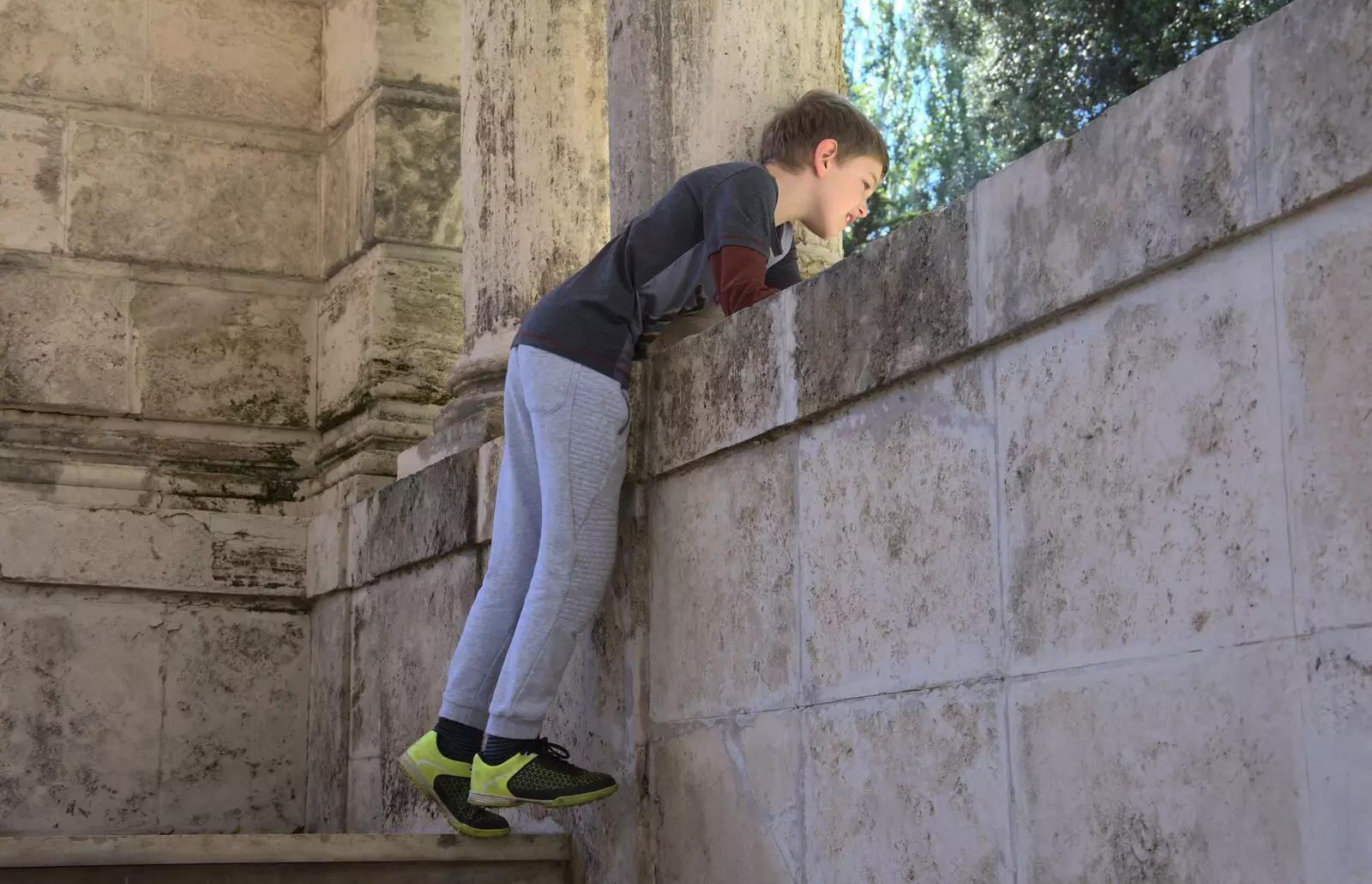 Fred peers over a wall, from Barcelona and Parc Montjuïc, Catalonia, Spain - 21st October 2017