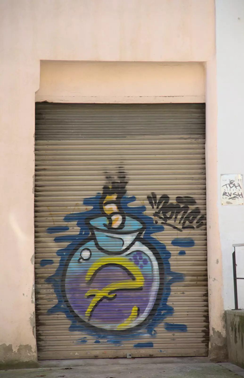 Graffiti on a shutter door, from Barcelona and Parc Montjuïc, Catalonia, Spain - 21st October 2017