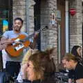 A musical act works the tables, Barcelona and Parc Montjuïc, Catalonia, Spain - 21st October 2017