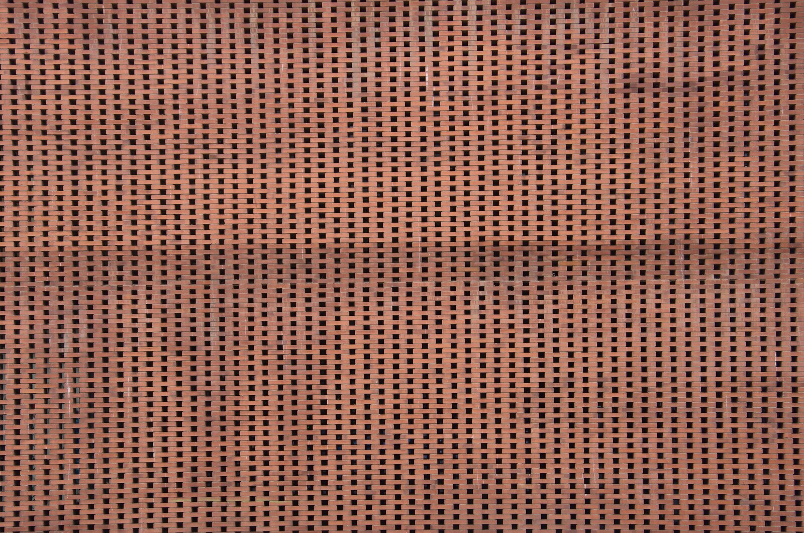 A massive spaced brick wall from L'Aquarium de Barcelona, Port Vell, Catalonia, Spain - 23rd October 2017