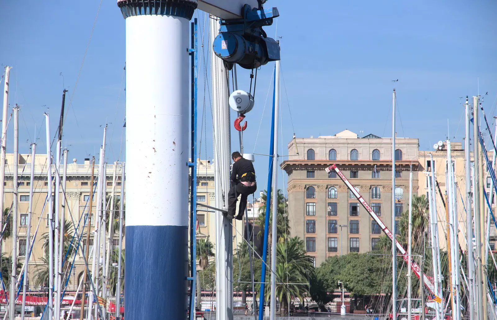 Some bloke dangles from a crane, from A Barcelona Bus Tour, Catalonia, Spain - 25th October 2017