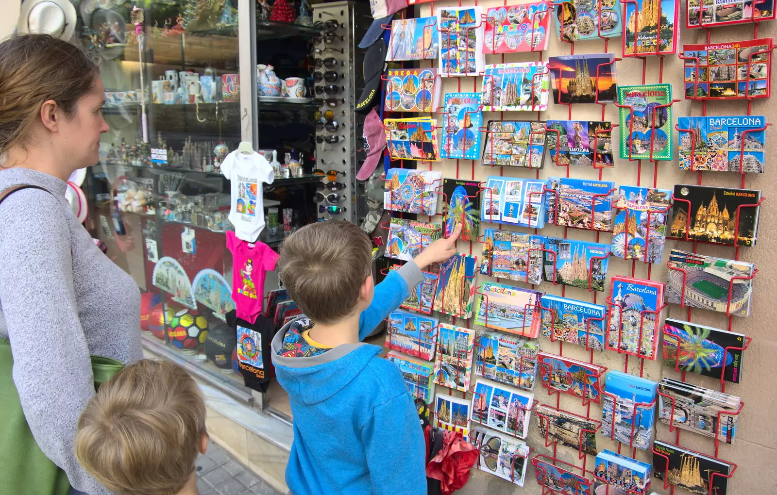 The boys choose postcards, from A Barcelona Bus Tour, Catalonia, Spain - 25th October 2017