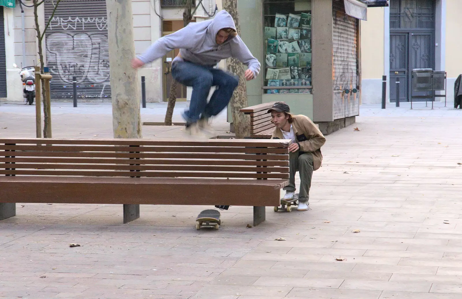 Dudes in a square do some stunt skateboard filming, from A Barcelona Bus Tour, Catalonia, Spain - 25th October 2017