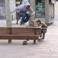 Dudes in a square do some stunt skateboard filming, A Barcelona Bus Tour, Catalonia, Spain - 25th October 2017