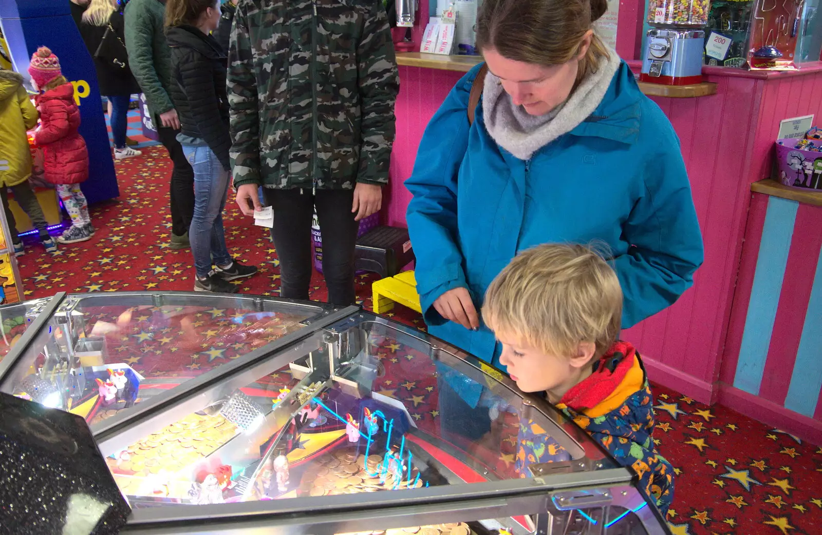 Harry looks at the 2p shove machines, from A Trip to the Amusements, Southwold Pier, Southwold, Suffolk - 5th November 2017