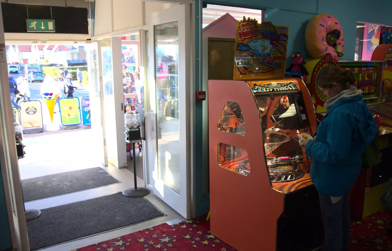 Isobel plays on a machine, from A Trip to the Amusements, Southwold Pier, Southwold, Suffolk - 5th November 2017