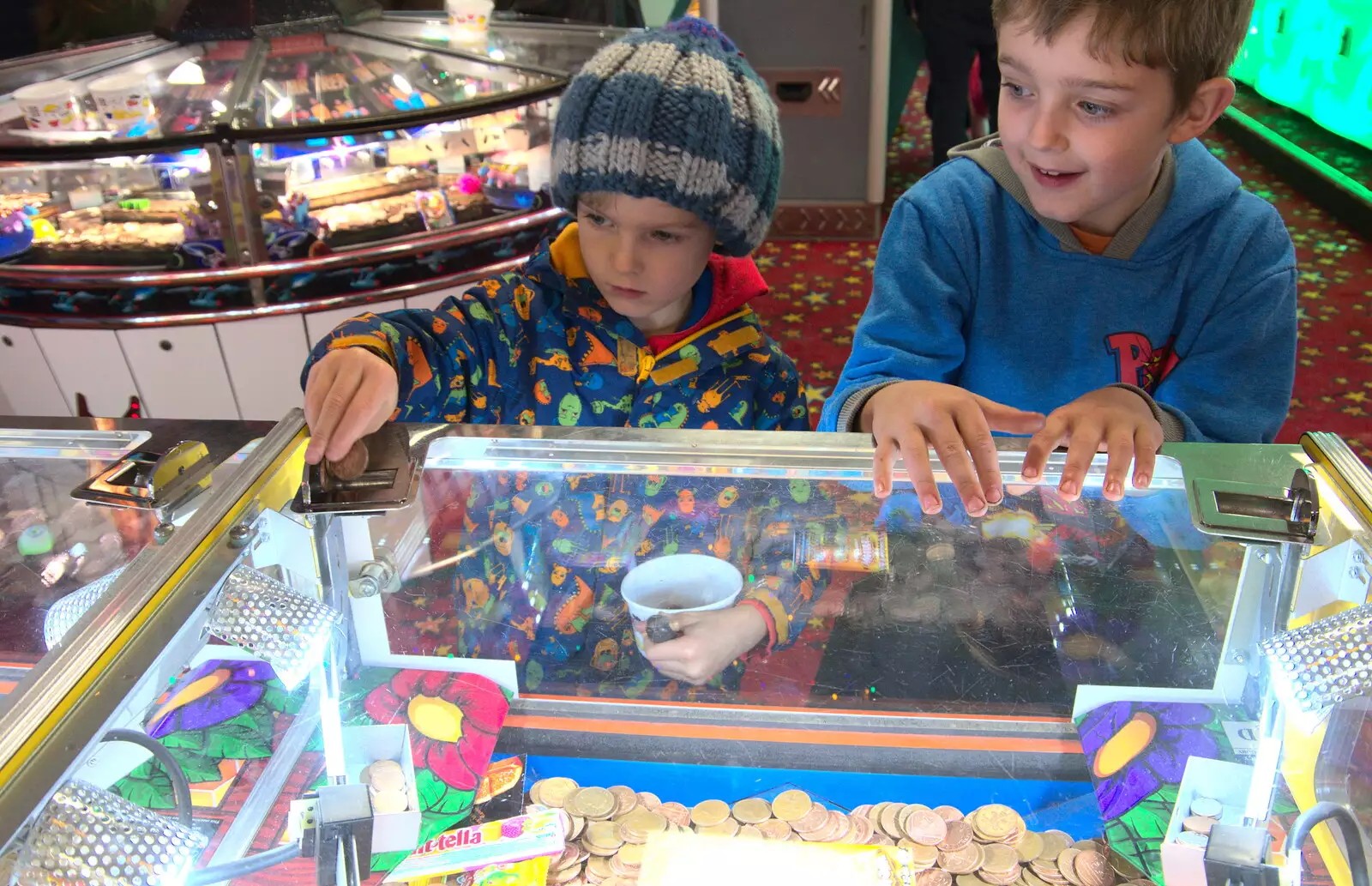 Harry loads up another 2p, from A Trip to the Amusements, Southwold Pier, Southwold, Suffolk - 5th November 2017