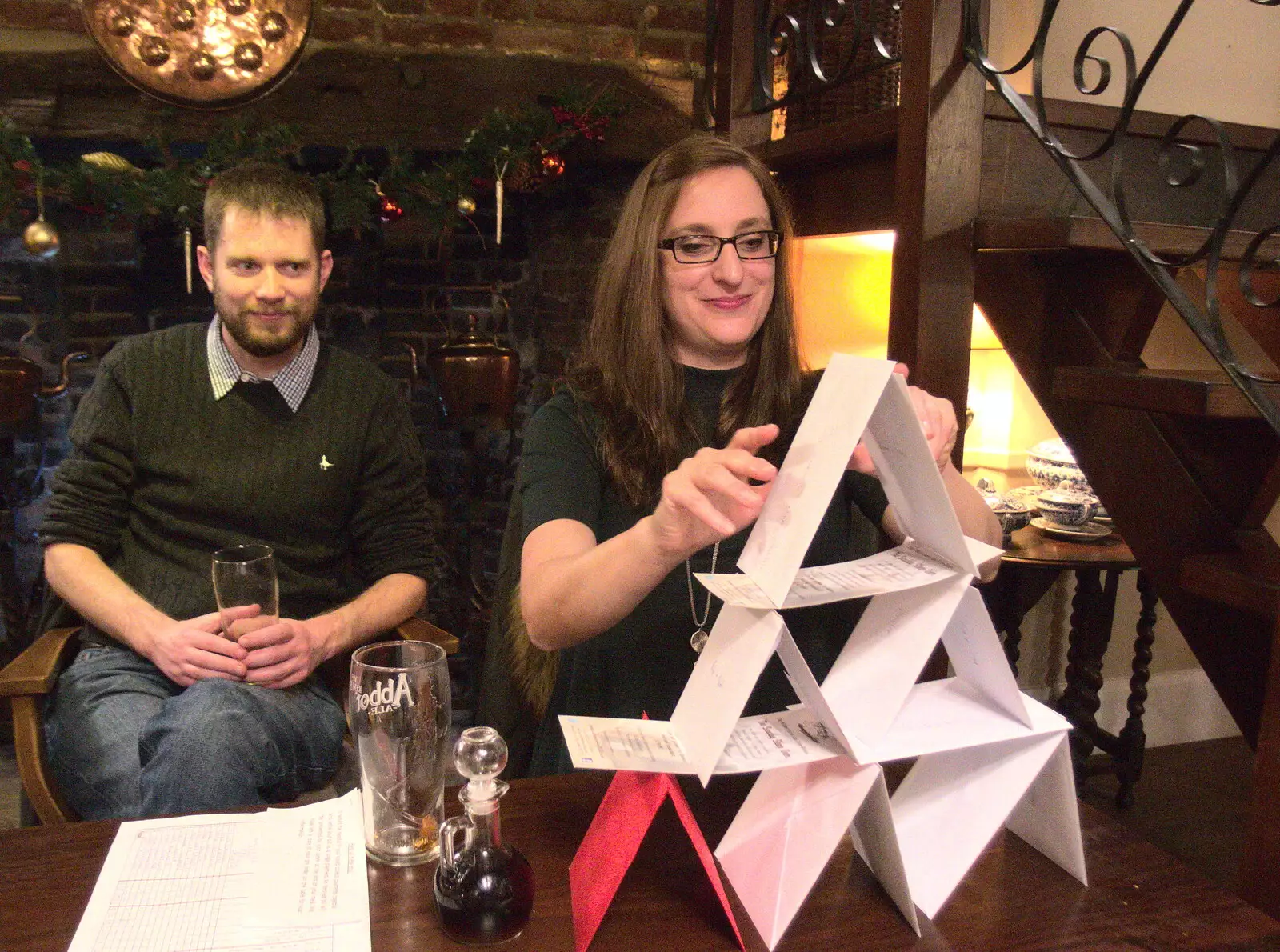 Suey does the house of cards thing with the menus, from The BSCC Christmas Dinner, White Horse, Stoke Ash, Suffolk - 2nd December 2017