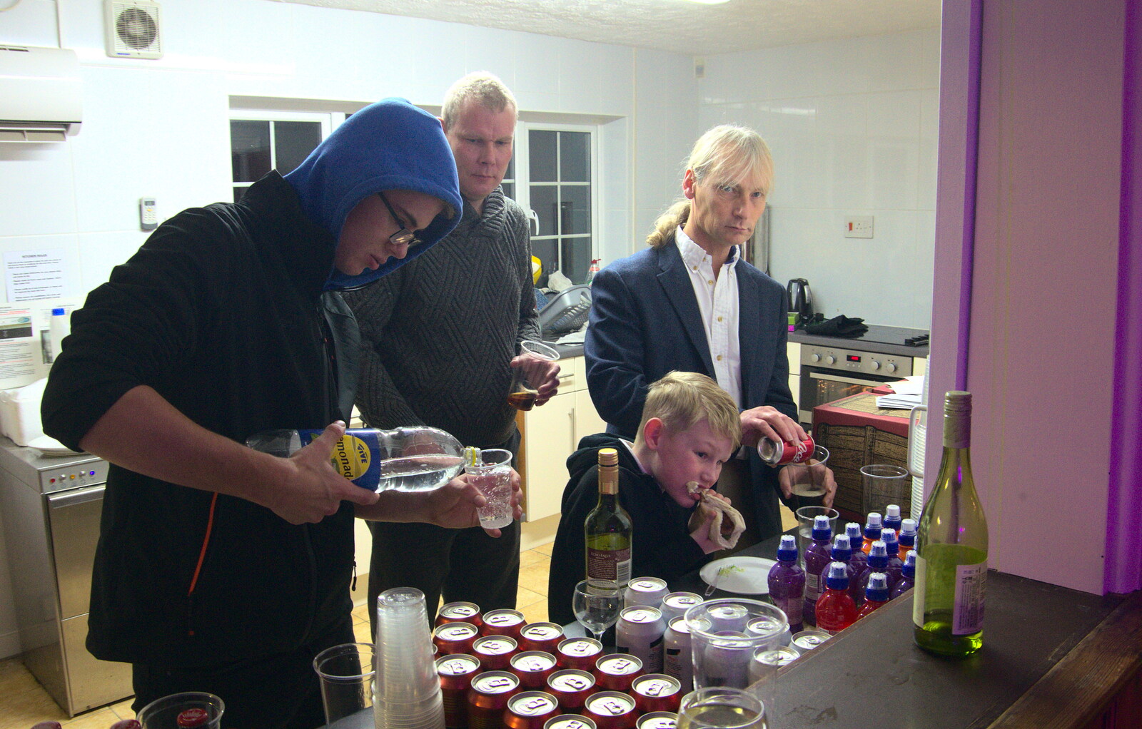 Tyler pours a lemonade as Jimmy look over from Bill's Birthday, The Lophams Village Hall, Norfolk - 9th December 2017