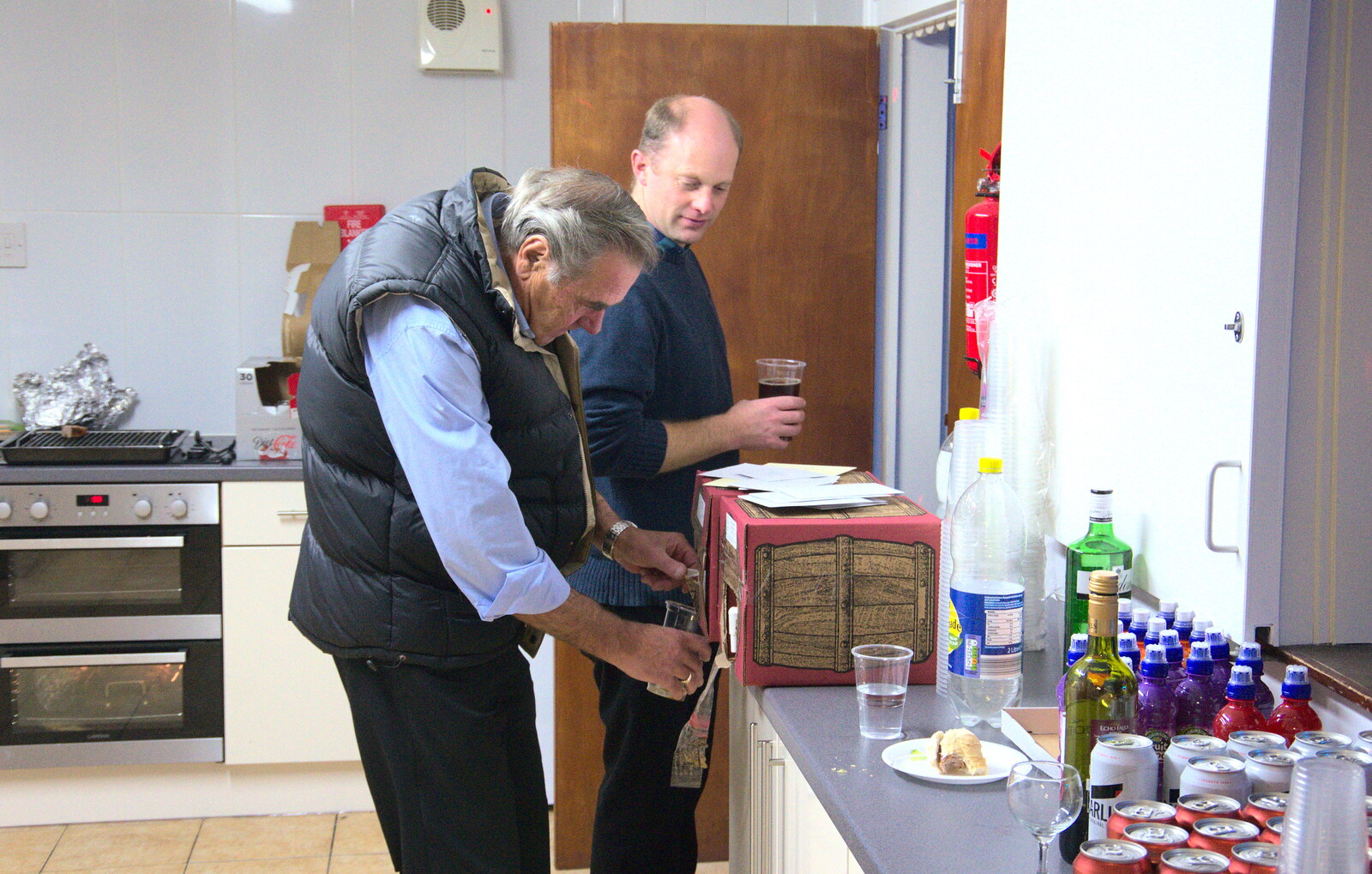 Alan gets a beer as Paul looks on from Bill's Birthday, The Lophams Village Hall, Norfolk - 9th December 2017
