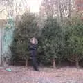 Fred leans insouciantly against a tree, An Early Snow Day and the Christmas Tree, Brome, Suffolk - 10th December 2017