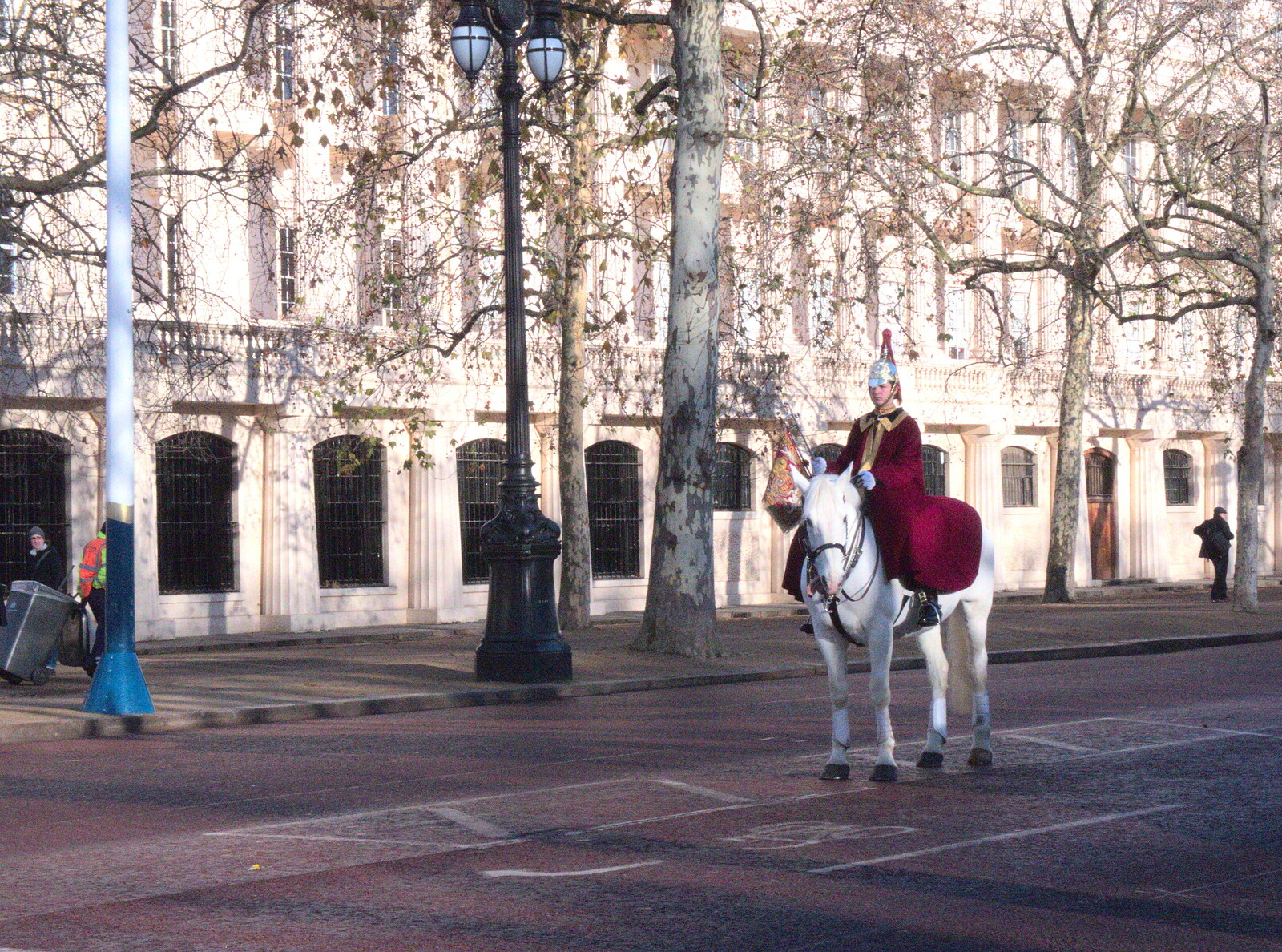 A lone horseman carries the Royal Standard on the Mall from A Work Lunch in Nandos, Bayswater Grove, West London - 20th December 2017