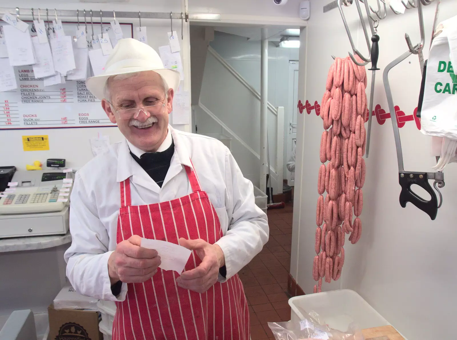 There are a lot of sausages hanging up in Browne's, from A Spot of Christmas Shopping, Norwich and Diss, Norfolk - 23rd December 2017