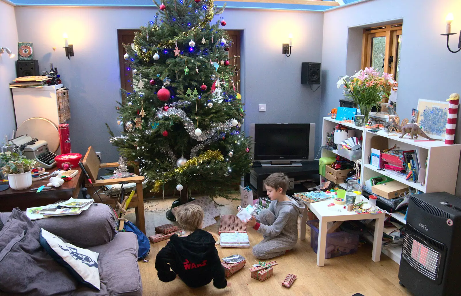 The boys get in some early present-opening, from Christmas Day and The Swan Inn, Brome, Suffolk - 25th December 2017