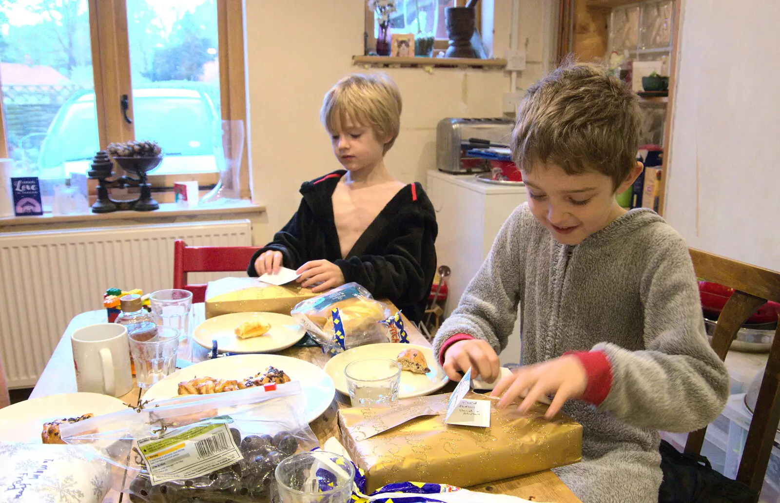 The boys get more presents to open, from Christmas Day and The Swan Inn, Brome, Suffolk - 25th December 2017