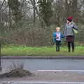 Harry and Isobel wait to cross the road, Christmas Day and The Swan Inn, Brome, Suffolk - 25th December 2017