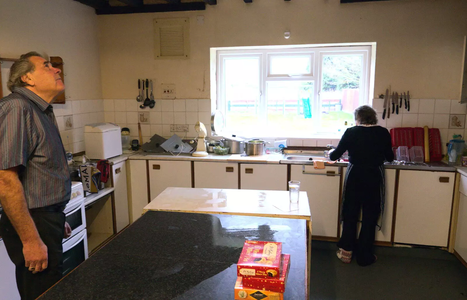 Alan inspects a rogue light in the Swan kitchen, from Christmas Day and The Swan Inn, Brome, Suffolk - 25th December 2017