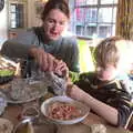 Isobel helps harry with prawn shells, Boxing Day in the Queen's Head, Eye, Suffolk - 26th December 2017